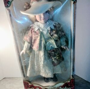 Elegant Porcelain Doll with Floral Outfit